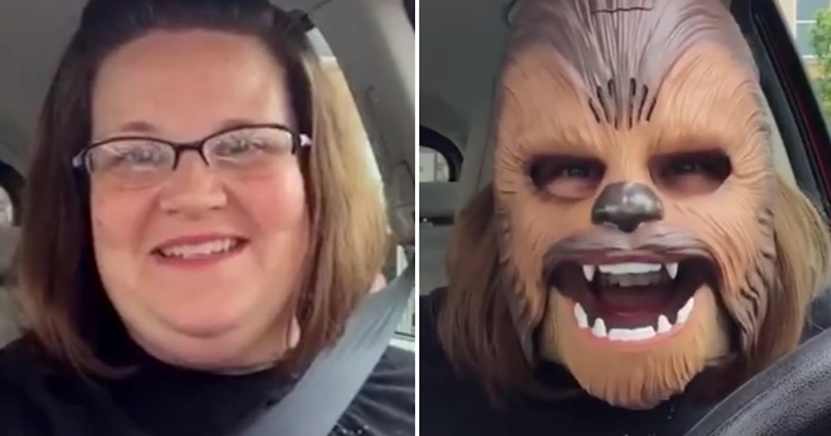 Woman laughing in Chewbacca mask sets on fire