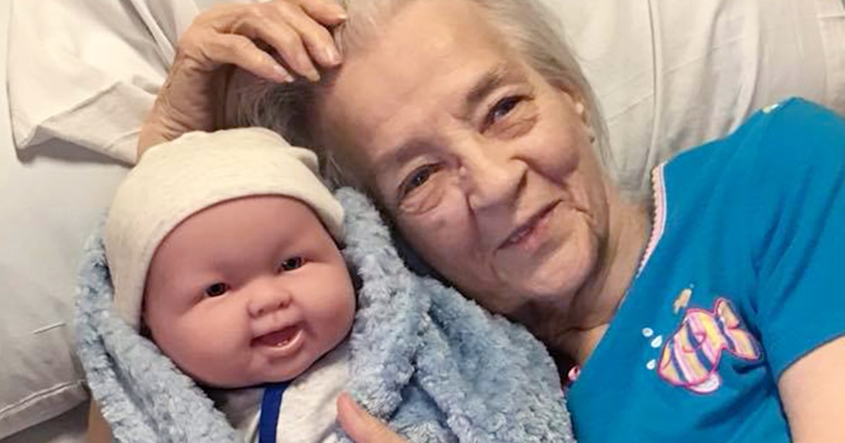Alzheimer s patients show joy when they receive baby dolls