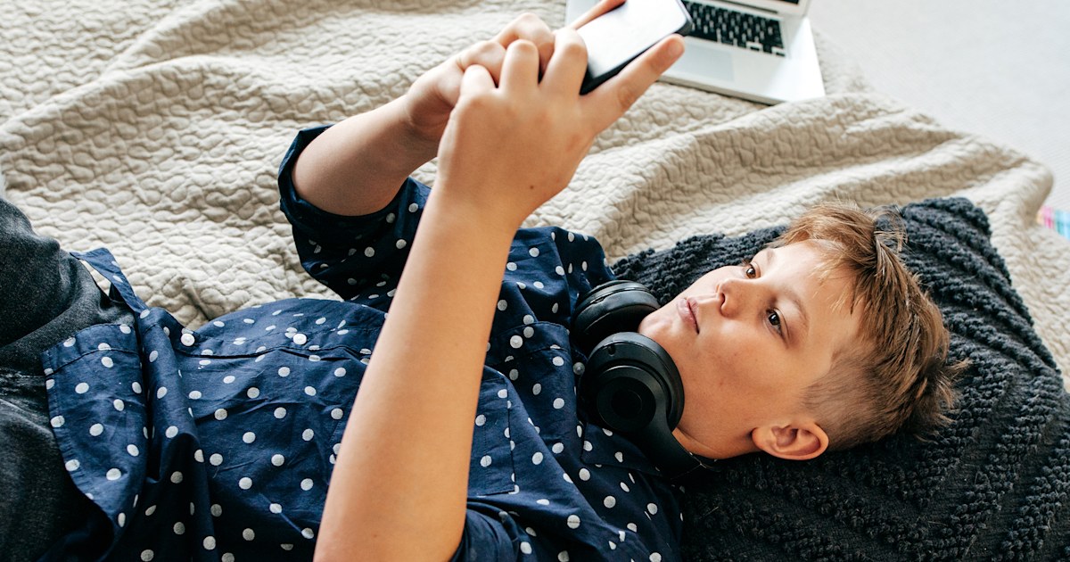 Is it OK to sit on your bed in outside clothes? Here's what experts say