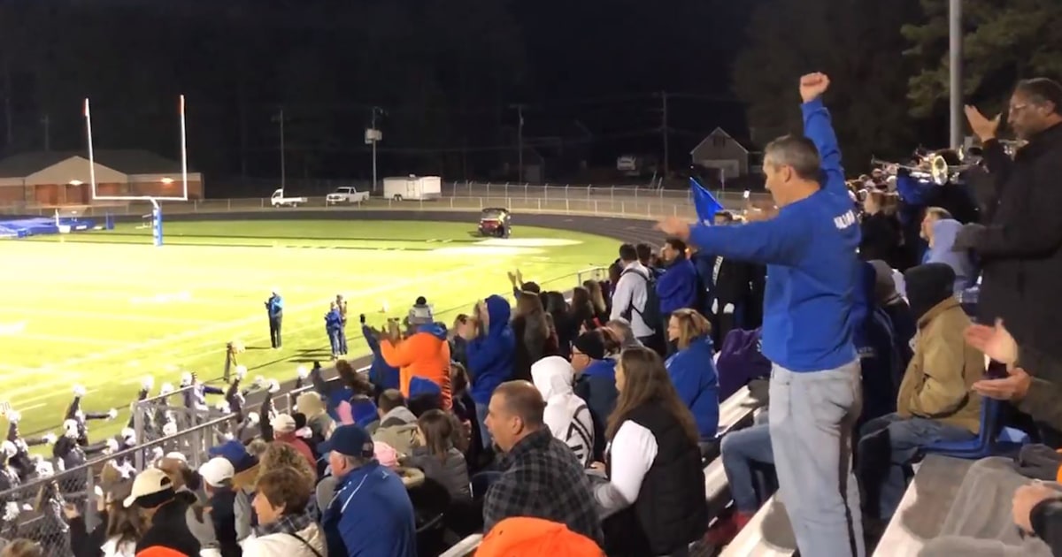 Dad In Viral Cheer Video Talks About Football Game Moves