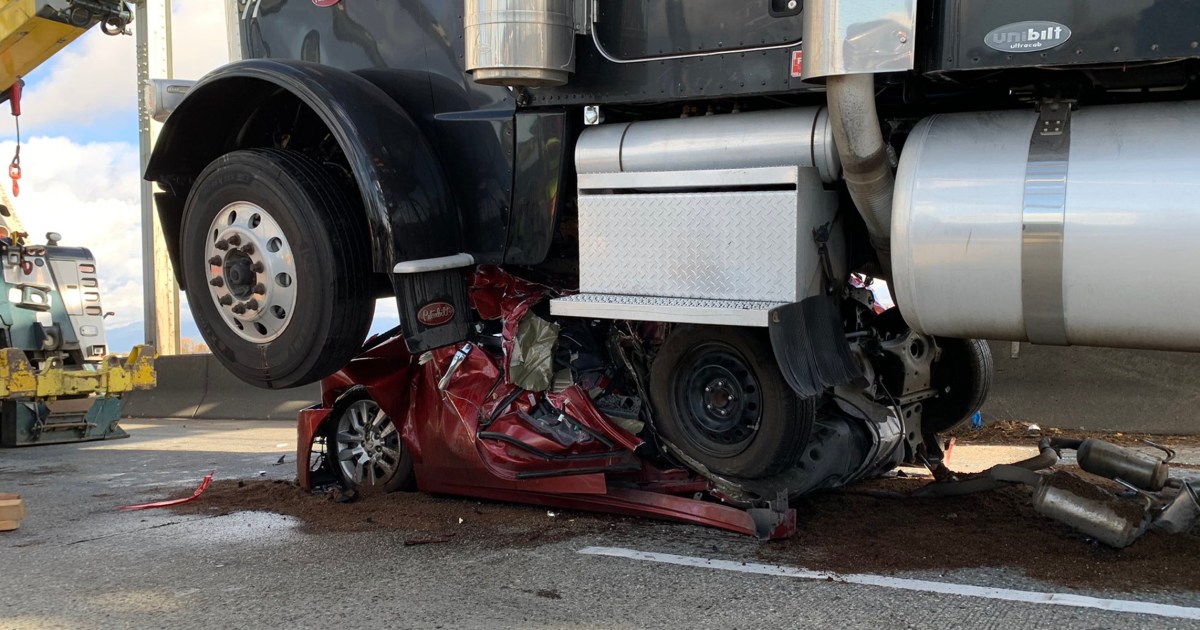 Woman survives after car was crushed from behind by semitruck image