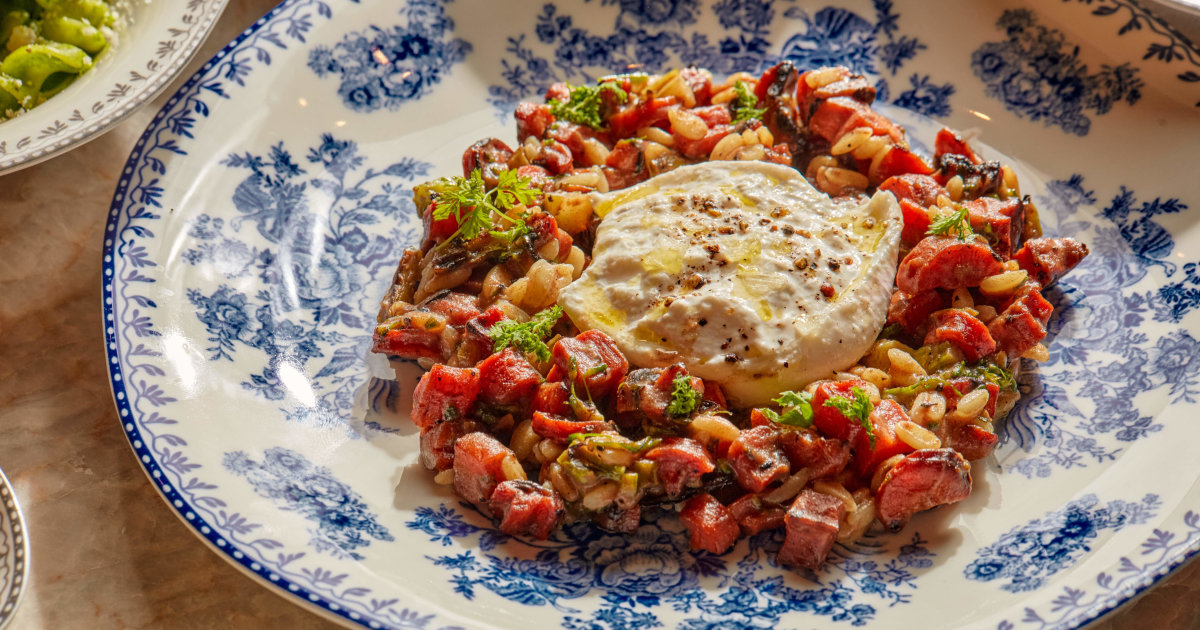 Toss roasted carrots and broccolini with orzo and a velvety date vinaigrette for an easy and exciting pasta salad.