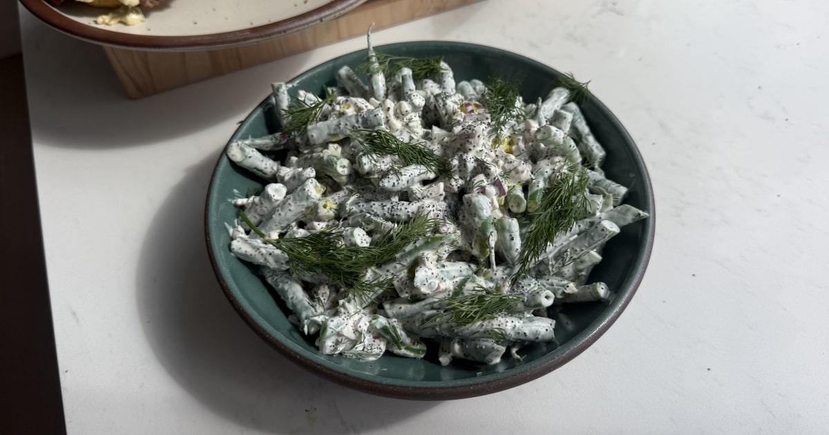Dress up green beans with poppy seeds, Greek yogurt, lemon, red onion and dill.