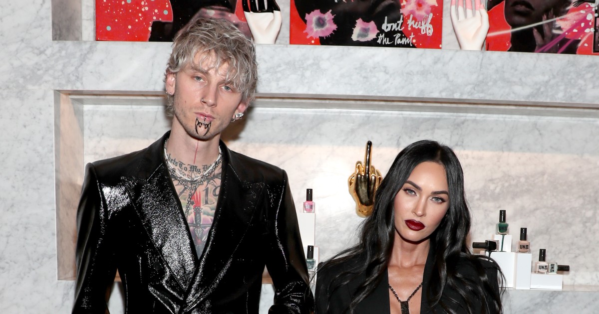 Machine Gun Kelly and Megan Fox walk red carpet chained to each other's ...