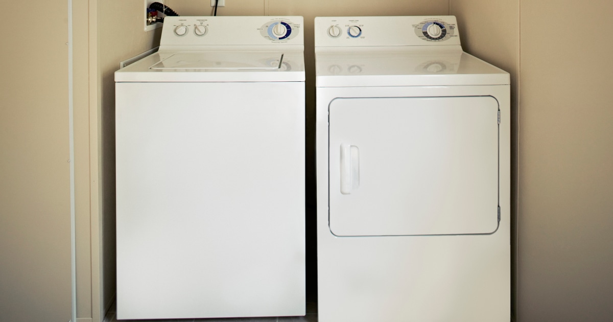 Boy, 8, dies after getting wedged between washer and dryer while