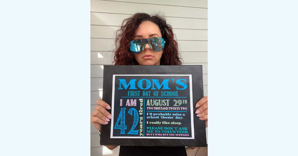 Tired Mom Shares Relatable Back to School Photo with Trendy Sign