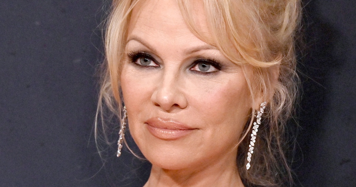 Pamela Anderson says she was ‘too shy’ to call back JFK Jr. in the ‘90s