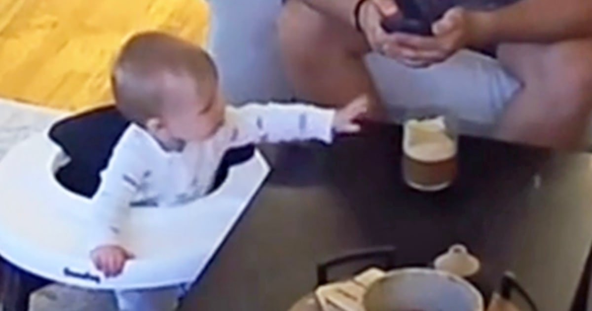 Baby Steals Coffee While Dad Distracted On Phone