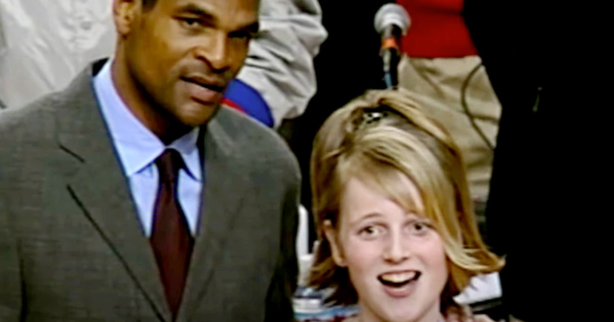 NBA coach helped her finish the national anthem at age 13. She came back 22 years later to try again