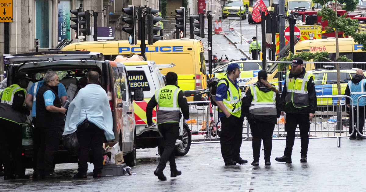 Car Collides With Pedestrians at Parade Celebrating Soccer Win in Liverpool, England