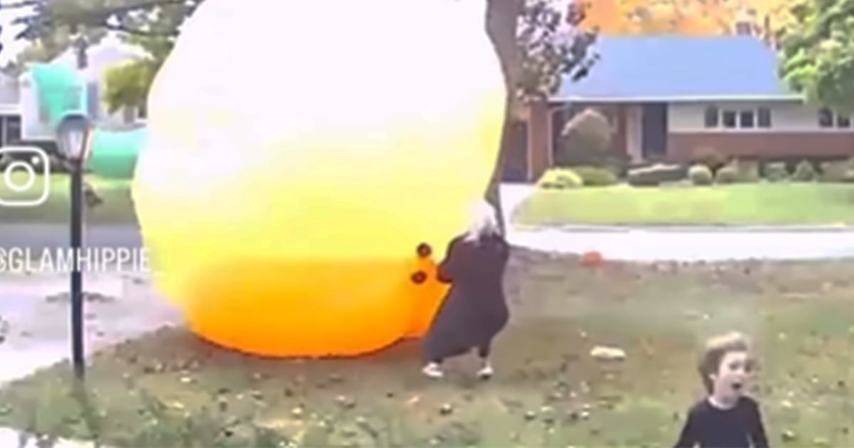 See Mom 'Lift Off' While Trying to Catch 20-Foot Inflatable Pumpkin