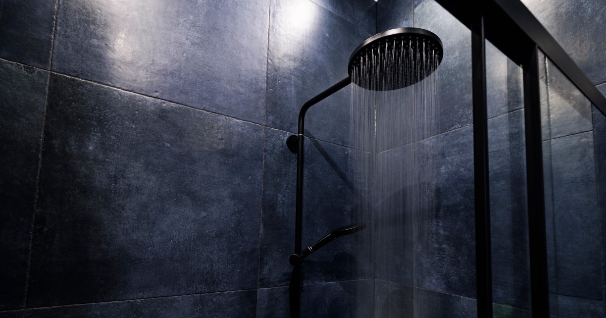 'Dark Showering' for Better Sleep Is Going Viral. Does It Work?