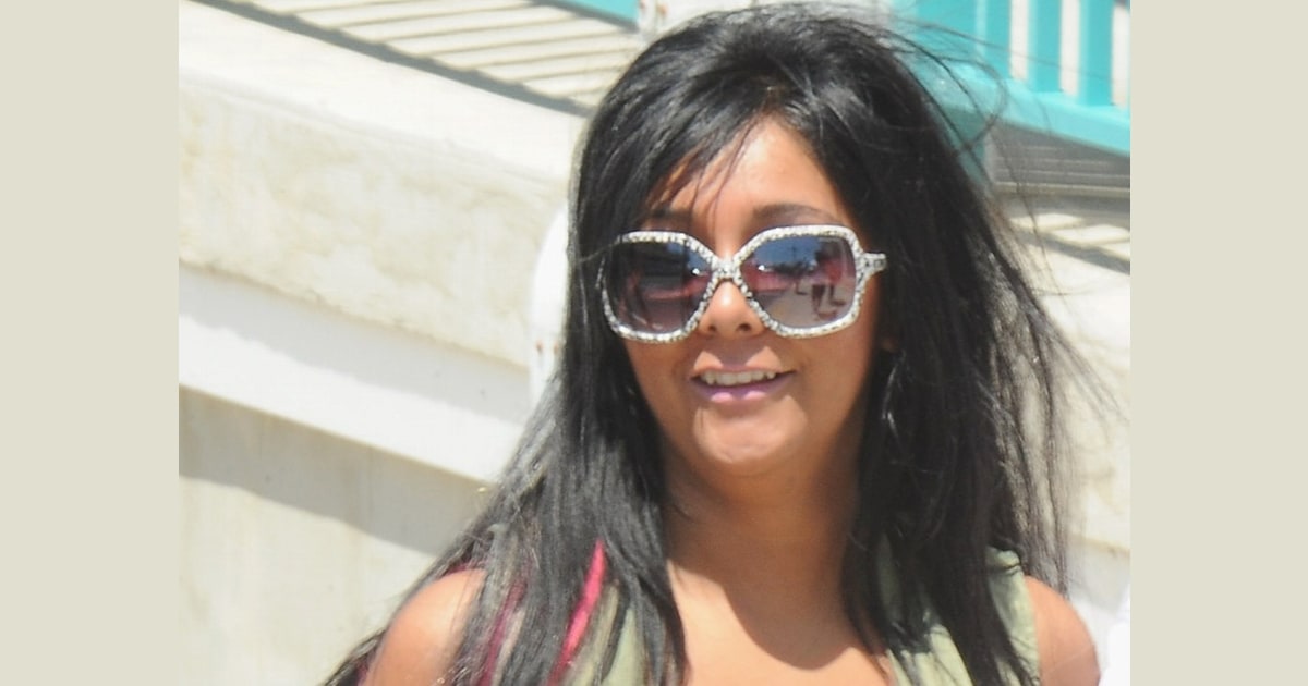 Italian style is NOT rubbing off on her! Snooki strolls through streets of  Florence in her worst outfit yet