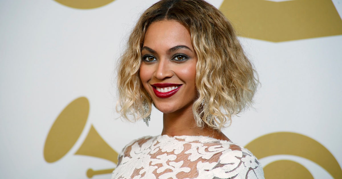 We re obsessed Beyonce s white lace Grammy Awards gown