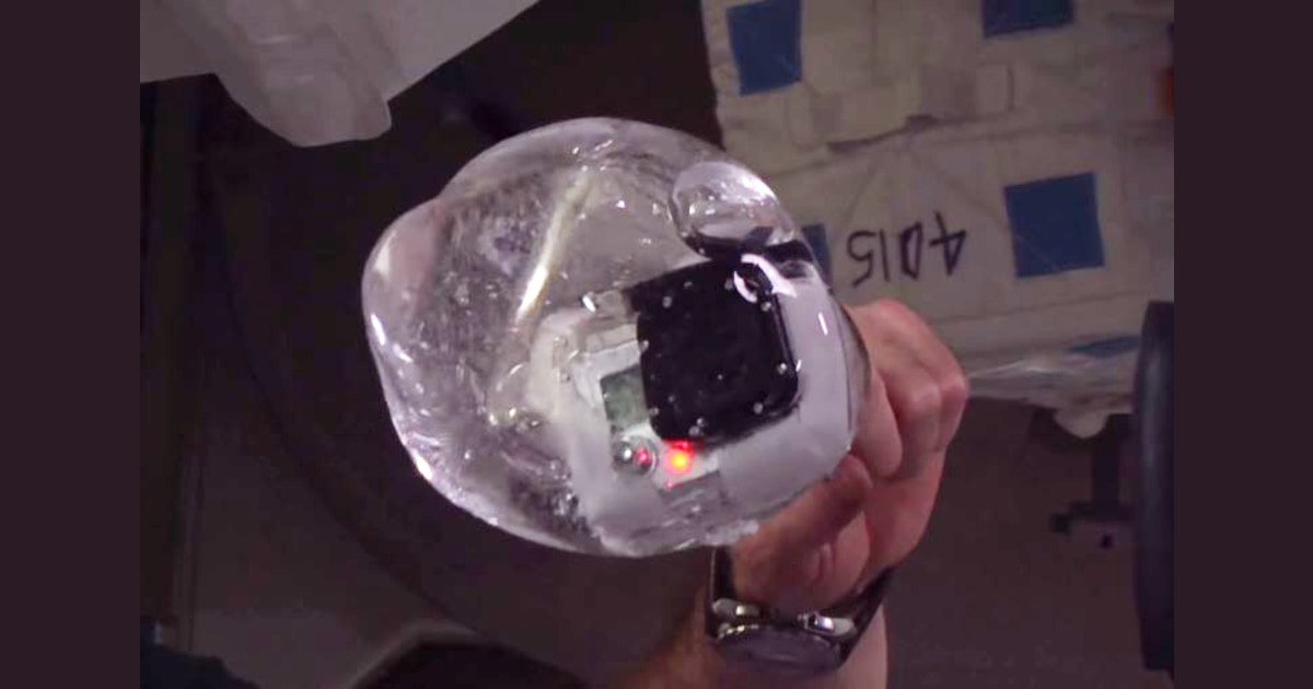 NASA astronauts play with GoPro in a floating bubble